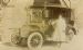 Old car and chauffeur